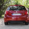 [Crevar] Vue arrière Peugeot 208 Féline 1.6 e-HDi 115 Rouge Érythrée 5p - 003